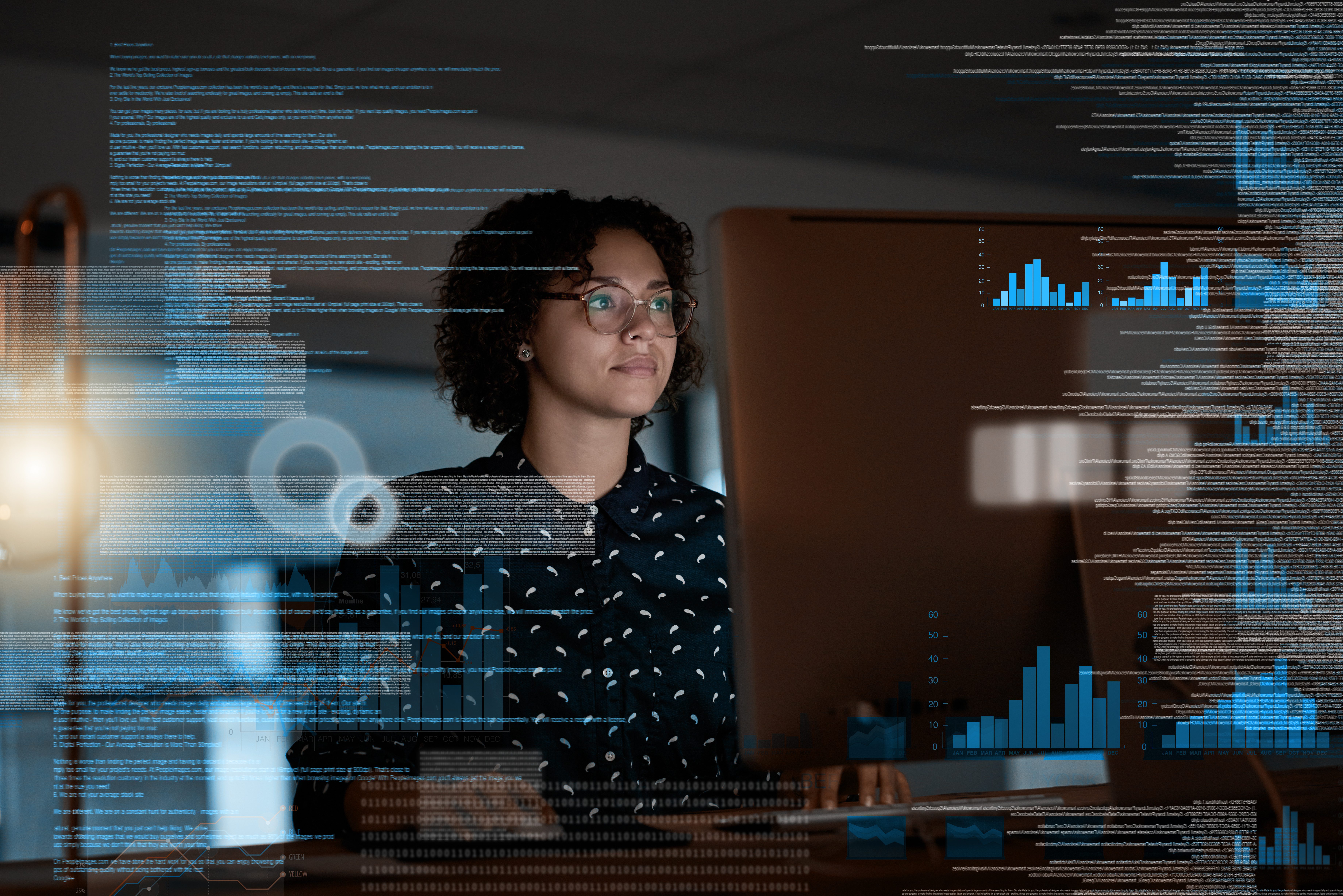 Photo of a female programmer working on a computer code at night