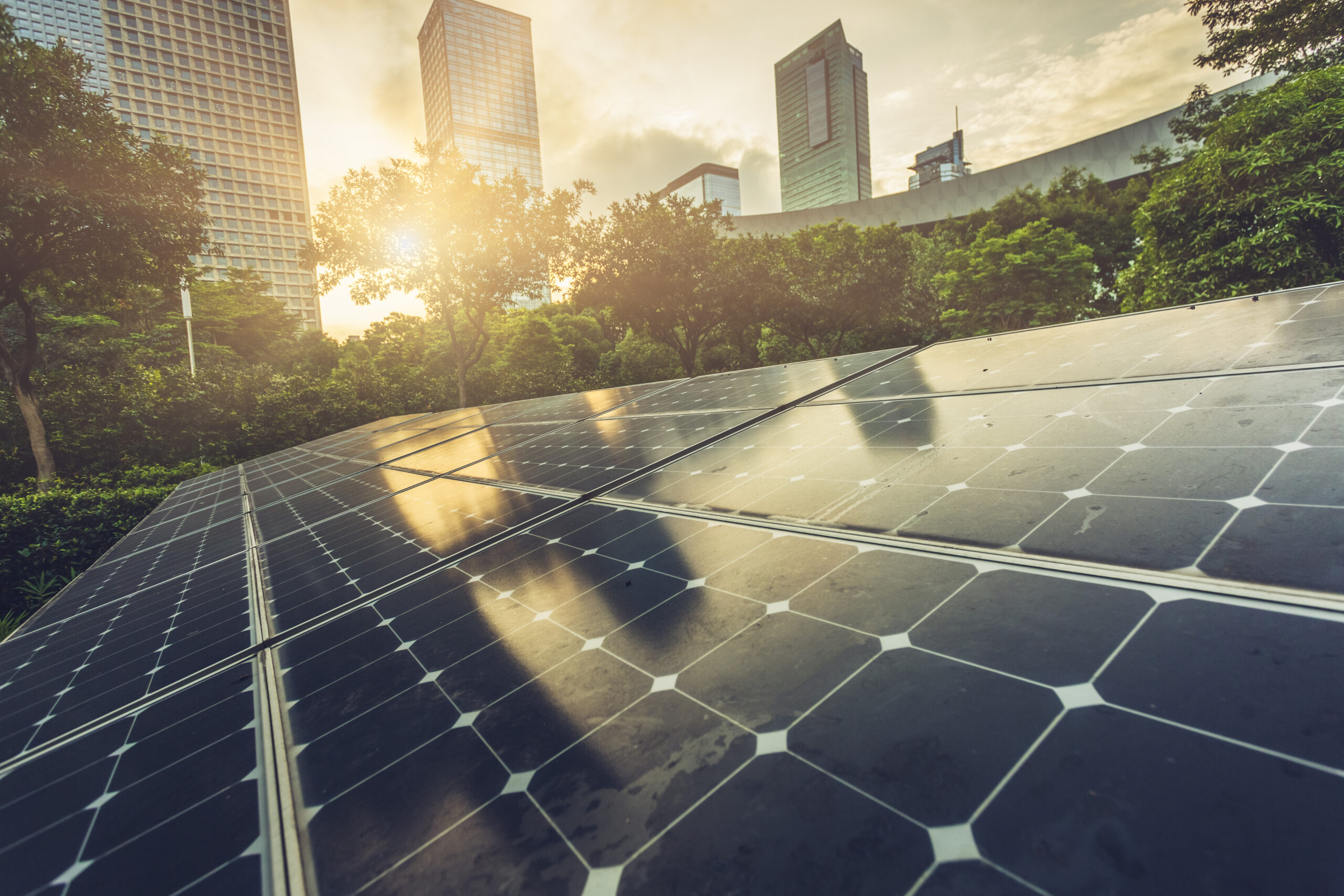 Roof top solar installation with shenzhen downtown skyline view as background, China.