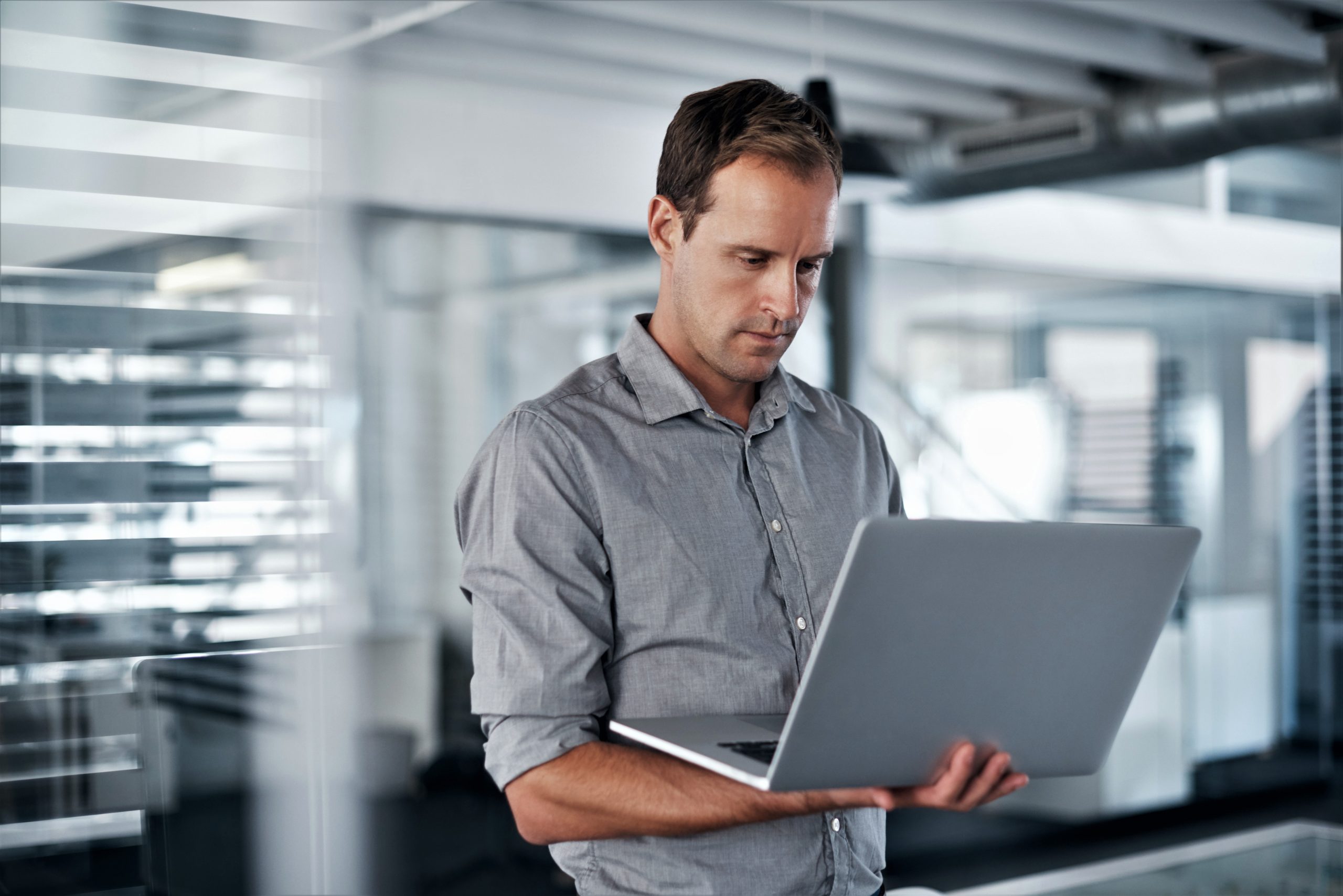 Businessman holding the computer