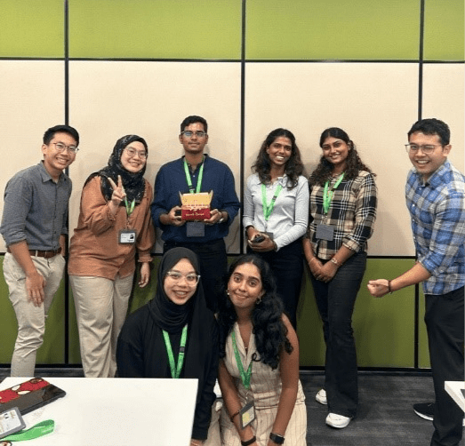 Divya during her Go Green internship, in the Schneider Electric office with other interns.